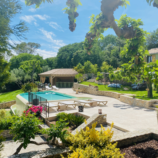 Poolside terrace and landscaped setting